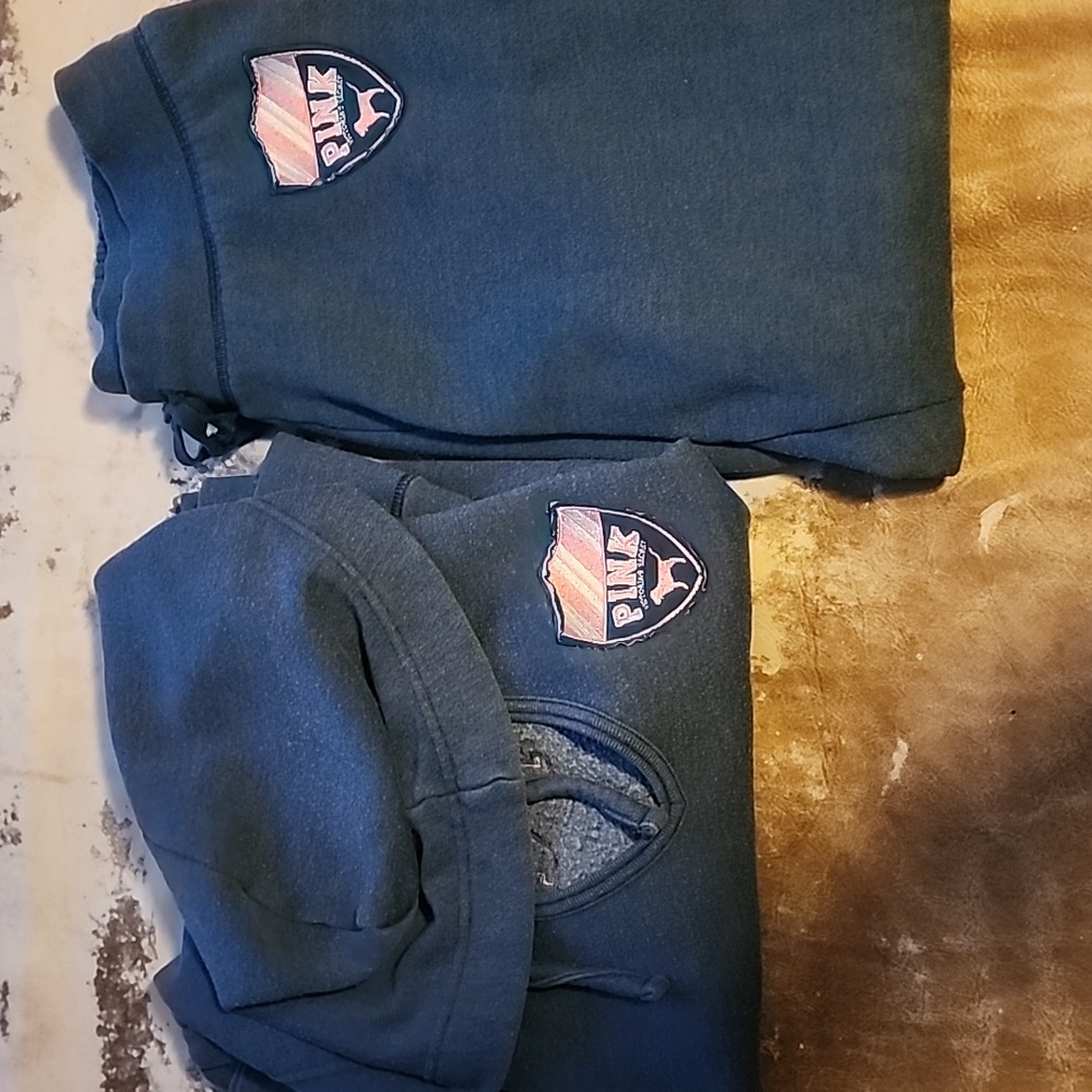 Pink hooded pullover sweatshirt and matching capris sweatpant.